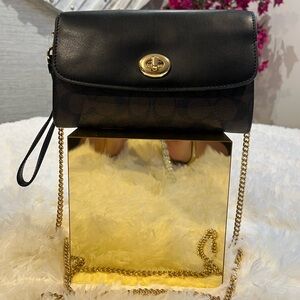 Elegant Black and Brown Women's Coach Bag.